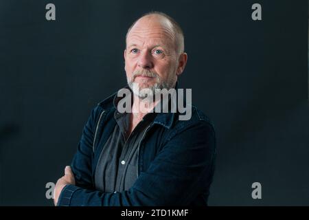 Der britische Autor Alex Renton nimmt an einem Fotogespräch während des Edinburgh International Book Festival am August 2017 in Edinburgh Teil. Stockfoto