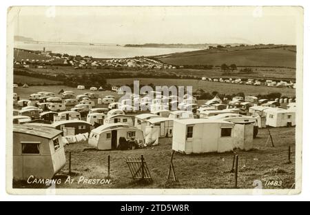 Original 1950's era postcard of a busy caravan park /campsite at Preston, near Weymouth, Dorset, U.K. dated /  posted August 1952 Stockfoto
