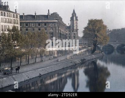 Paris (1. Arrondissement), Frankreich das Palais de Justice quai des Orfèvres, von der Pont Neuf aus gesehen, Verkehr, Gesellschaft, Wohnraum, Architektur, HD, Tiertransport, Fluss, Justiz, Bauingenieurwesen, existiert in High Definition, öffentlicher Baukunst, Quay, Cart, Palace, Schloss, Brücke, Frankreich, Paris, Palais de Justice aus der Pont Neuf, Île de la Cité, Conciergerie, Palais de Justice, 21/10/1919 - 21/10/1919, Léon, Auguste, Fotograf, Autochrome, Foto, Glas, Autochrome, Foto, positiv, Horizontal, Größe 9 x 12 cm Stockfoto