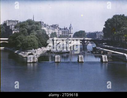Paris (1.-4. Arr.), Frankreich die Stauschleuse Monnaie, die Pont-Neuf und die Île de la Cité, Habitat, Architektur, HD, Verkehr, Insel, Fluss, Bauingenieurwesen, existiert in High Definition, öffentliche Bauarchitektur, Waschhaus, Kai, Boot, Staudamm, Hydraulikanlage, Flusstransport, See, Brücke, Frankreich, Paris, Le Pont Neuf, Paris, 09.06/1920 - 09.06.1920, Léon, Auguste, Fotograf, Autochrome, Foto, Glas, Autochrome, Foto, positiv, horizontal, Größe 9 x 12 cm Stockfoto