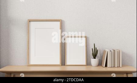 Minimalistischer Holzrahmen auf einem Holztisch vor der weißen Wand in einem gemütlichen skandinavischen Raum. Nahaufnahme der Vorderansicht. 3D-Rendering, 3D-Illustrat Stockfoto