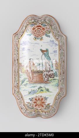 Pinselrücken, anonym, ca. 1730 - ca. 1760 Pinselrücken, längs und gelappt auf zwei Seiten mehrfarbig bemalt mit Christus und der Samaritanerin. Delft . Pinselrücken, lang und auf zwei Seiten gelappt mehrfarbig bemalt mit Christus und der samaritanischen Frau. Delft . Stockfoto