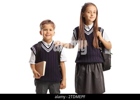 Schulkinder in Uniformen isoliert auf weißem Hintergrund Stockfoto