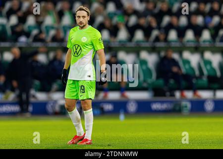 Wolfsburg, Deutschland. Dezember 2023. firo: 09.12.2023, Fußball, 1. Liga, 1. Bundesliga, Saison 2023/2024, VfL Wolfsburg - SC Freiburg Lovro Majer (VfL Wolfsburg) ganze Figur, Quelle: dpa/Alamy Live News Stockfoto