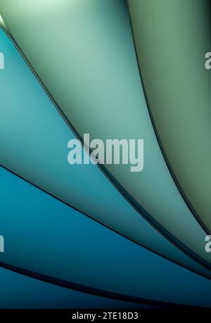 Blätter gefaltetes Papier, fotografiert mit zwei separaten Blitzen und mit farbigen Gelen, um die Farbe hinzuzufügen Stockfoto