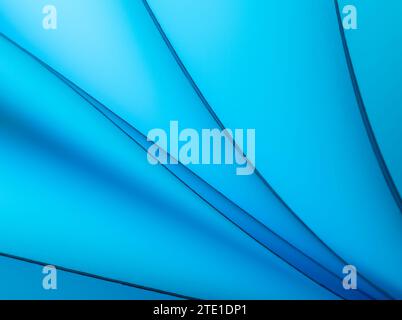 Blätter gefaltetes Papier, fotografiert mit zwei separaten Blitzen und mit farbigen Gelen, um die Farbe hinzuzufügen Stockfoto