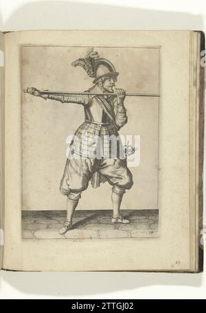 Soldat, der seine Spieße mit beiden Händen horizontal auf Schulterhöhe trägt, seine rechte Hand am Fuß der Waffe (Nr. 14), ca. 1600, 1597 – 1608 Ein Soldat, der ein Spieß (Lanze) ist, mit beiden Händen waagerecht auf Schulterhöhe, seine rechte Hand am Fuß der Waffe (Nr. 14), ca. 1600. Das ist der dritte Akt, um die Spione zu senken, um unter einem Tresor durchzukommen. Platte 14 in der Anleitung für den Umgang mit den Spießen: Schriftliche Anweisung über die Gegenspieler, über den richtigen Gebrauch oder alles, was ein Seelendiger im Umgang mit dem Hecht wissen muss. Ein Teil der Illustrationen in englischer Sprache Stockfoto