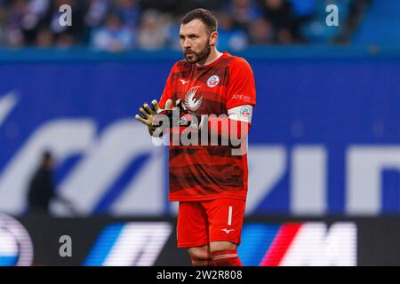 Rostock, Deutschland. Dezember 2023. firo : 10.12.2023, Fußball, 1. Liga, 1. Bundesliga, Saison 2023/2024, FC Hansa Rostock - FC Schalke 04 Markus Kolke (FC Hansa Rostock) Halbzahl, Credit: dpa/Alamy Live News Stockfoto