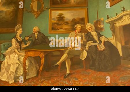 England, Hampshire, Hinton Hampner, Hinton Hampner Country House, The Dining Room, Painting of the Dutton Family Spielkarten Stockfoto