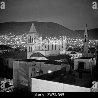 Stadtbild von Damaskus am Abend, christliche Kirche links ca. 1950-1955 Stockfoto