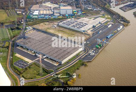 Luftaufnahme, Logport VI (sechs) Industriegebiet Logistikdienstleistungen, umgeben von herbstlichen Laubbäumen, Alt-Walsum, Duisburg, Ruhrgebiet, Nordrhein Stockfoto