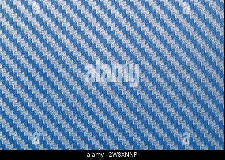 Blauer Kevlar-Kohlefaser-Hintergrund, Material Kevlar-Kohlefaser-Verbundstoff. Stockfoto