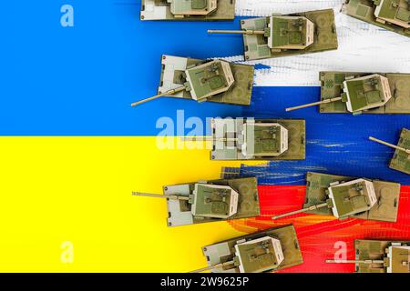 Militärischer Angriff auf die Ukraine. Russische Kampfpanzer erobern ukrainische Karte. 3D-Rendering Stockfoto