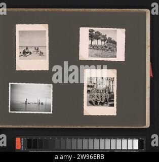 Verschiedene Themen, Anonym, Fotoalbum-Magazin 1940 mit vier Fotos deutscher Soldaten am Strand, Gefangener Waffen, einem versunkenen Schiff und einem Gruppenfoto auf einem Platz in Brügge, Juni 1940. Teil des Fotoalbums der Wehrmacht 1938–1941. Unterstützung für Fotos in Belgien. Pappe Gelatine Silberdruck die Firma, die Einheit, die Truppe  Militärdienst. Strand (als Erholungsort). Schusswaffen. Dampfschiff, Motorschiff. Schiffsunfall; Krankheit und Tod auf See Belgien. Brügge Stockfoto