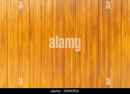Orangefarbene Holzhintergrundstruktur wird für dekorative Kunstwerke verwendet. Stockfoto