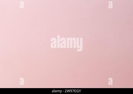 Schöner rosafarbener Papierhintergrund wird für Tapeten, Vorlagen und dekorative Kunstwerke verwendet. Stockfoto