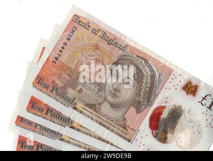 Zehn-Pfund-Notizen mit einem Porträt von Jane Austen aus Großbritannien/Großbritannien auf weißem Hintergrund. Stockfoto