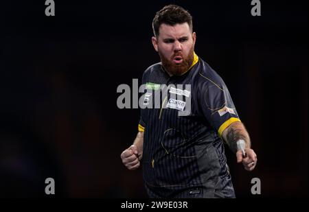 Scott Williams reagierte in seinem Spiel gegen Martin Schindler am 10. Tag der Paddy Power World Darts Championship im Alexandra Palace, London. Bilddatum: Mittwoch, 27. Dezember 2023. Stockfoto