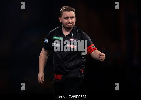 Martin Schindler reagierte in seinem Spiel gegen Scott Williams am 10. Tag der Paddy Power World Darts Championship im Alexandra Palace, London. Bilddatum: Mittwoch, 27. Dezember 2023. Stockfoto