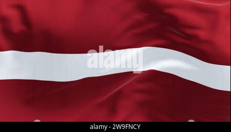 Nahaufnahme der lettischen Nationalflagge, die im Wind weht. Karminrotes Feld mit einem schmalen weißen Streifen in der Mitte. Rendern der 3D-Darstellung. Flut Stockfoto