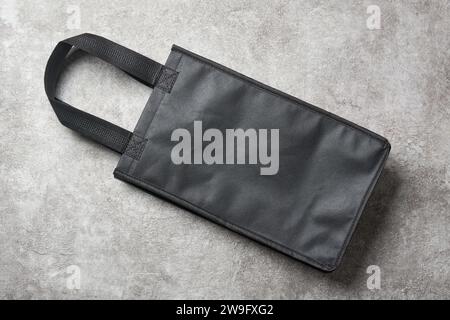 Set aus schwarzem Canvas-Stoff-Einkaufstasche, umweltfreundliche Alternative zu Kunststoff, stilvolle, robuste und wiederverwendbare Tasche für Lebensmittel und Einkäufe, blank Stockfoto