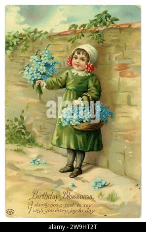 Original, charmante Edwardian Geburtstagsgrußkarte des kleinen Mädchens mit Korb von Forget Me Nots., datiert / veröffentlicht Prestwich, Großbritannien 1910 Stockfoto