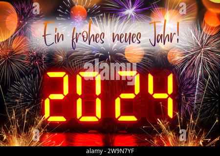 FOTOMONTAGE, Leuchtanzeige mit der Jahreszahl 2024, Feuerwerk und dem Schriftzug ein frohes neues Jahr, Symbolfoto Neujahr 2024 *** FOTOMONTAGE, Leuchtanzeige mit dem Jahr 2024, Feuerwerk und den Worten Happy New Year, Symbolfoto Neujahr 2024 Stockfoto