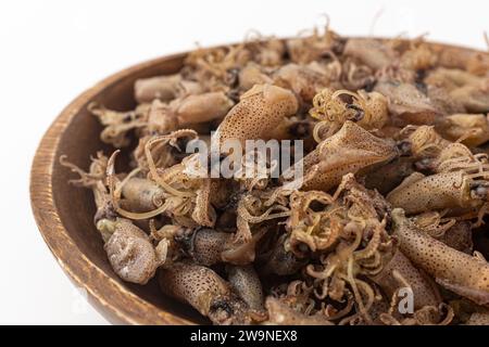 Trockener Tintenfisch auf weißem Hintergrund Stockfoto