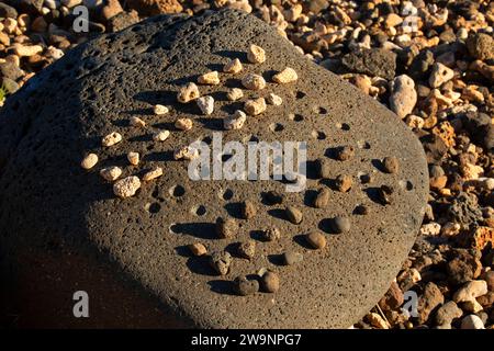 Hawaiian Konane Schachbrett, Lapakahi State Historical Park, Hawaii Stockfoto