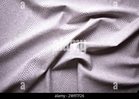 Weißes, veganes Schlangenleder-Textil, Draufsicht Stockfoto