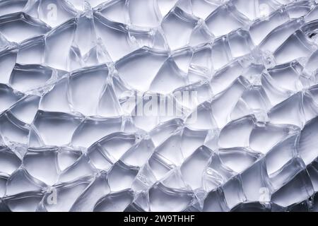 Makrotextur von gebrochenem Weißglas Stockfoto