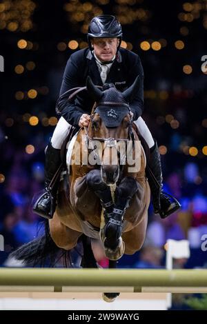 Mechelen, Belgien. Dezember 2023 30. Fahrer Willem Greve mit Highway in Aktion während des FEI World Cup Jumping Wettkampfes beim „Vlaanderens Kerstjumping – Memorial Eric Wauters“ Reitsport-Event in Mechelen am Samstag, den 30. Dezember 2023. BELGA FOTO JASPER JACOBS Credit: Belga News Agency/Alamy Live News Stockfoto