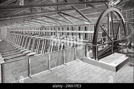 Eine Batterie voller Energiehämmer in einer Goldmine in Bendigo. Victoria, Australien. Sechs Monate in Australien 1878 von Desire Charnay (1828 - 1915) Stich aus dem 19. Jahrhundert aus Le Tour du Monde 1880 Stockfoto