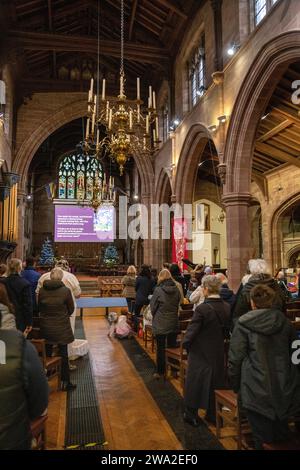 Großbritannien, England, Cheshire, Macclesfield, St. Michael’s Church Christmas Family Carol Service Stockfoto