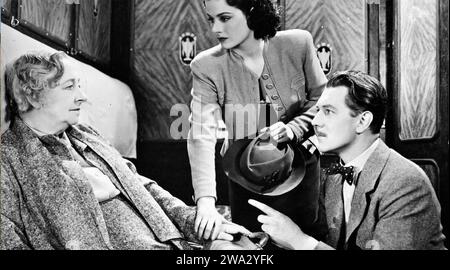 DIE DAME VERSCHWINDET 1938 den Gaumont-britischen Film mit From Left: May Whitty, Margaret Lockwood, Michael Redgrave Stockfoto