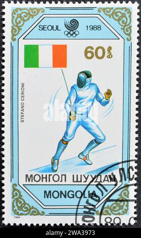 Gestempelte Briefmarke, gedruckt von der Mongolei, auf der Stefano Cerioni, Italien, Olympische Sommerspiele 1988 - Seoul (Medaillen), um 1980 zu sehen ist. Stockfoto