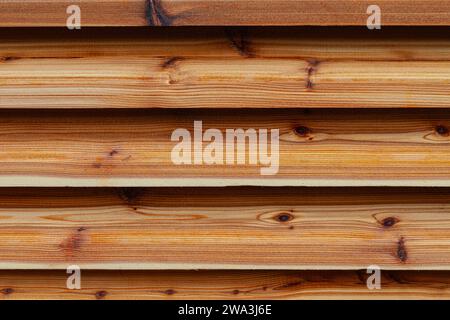 Abstraktes Bild von Western Red Cedar Lamellen, die eine Extraktionsöffnung bedecken Stockfoto