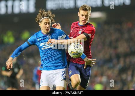 Glasgow, Schottland, Großbritannien. Januar 24. Glasgow, Großbritannien. Im ersten Spiel des neuen Jahres spielten die Rangers Kilmarnock im Ibrox Stadium in Glasgow, Schottland, Großbritannien in der schottischen Premiership. Das Datum ist bedeutend, weil es der 53. Jahrestag der "Ibrox-Katastrophe" ist, als 66 Menschen ihr Leben verloren und mehr als 200 verletzt wurden, während der schlimmsten Fußballkatastrophe in Großbritannien zu dieser Zeit. Beide Teams und Unterstützer zollten der Katastrophe Tribut. Quelle: Findlay/Alamy Live News Stockfoto