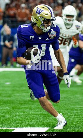 1. Januar 2024 New Orleans LA U.S.A. Washington Wide Receiver Jalen McMillan (11) spielt mit dem Ball während des NCAA Allstate Sugar Bowl Semifinal-Fußballspiels zwischen Washington Huskies und den Texas Longhorns. Washington schlug Texas 37-31 im Caesars Superdome New Orleans, LA Thurman James/CSM Stockfoto