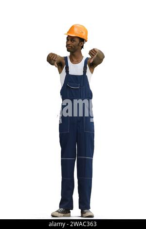 Ein Bauarbeiter auf weißem Hintergrund in voller Höhe zeigt die Daumen nach unten Stockfoto
