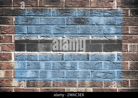 Botswana Flagge auf Backsteinmauern Hintergrund Stockfoto