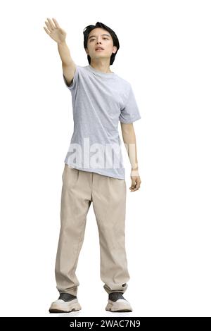 Ein Kerl in einem grauen T-Shirt, auf weißem Hintergrund, in voller Länge, bettelnd Stockfoto