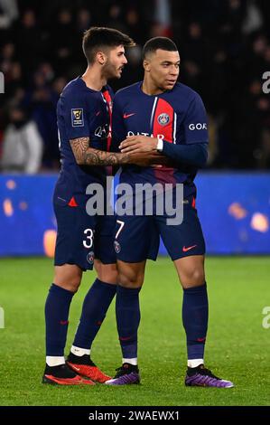 Paris, Frankreich. Januar 2024. Julien Mattia/Le Pictorium – PSG – Toulouse FC – 03/01/2024 – France/Ile-de-France (Region)/Paris – Kylian Mbappe und Lucas Beraldo bei der Champions Trophy zwischen PSG und Toulouse FC im Parc de Princes, 03. Januar 2024. Quelle: LE PICTORIUM/Alamy Live News Stockfoto