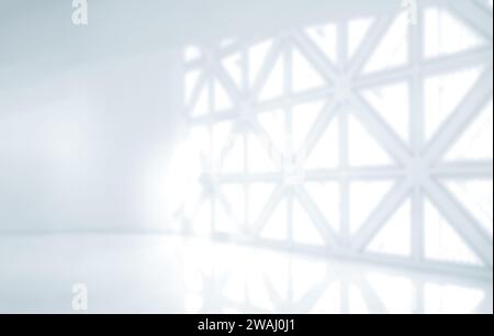 Abstrakter verschwommener moderner Arbeitsbereich Hintergrund, weißes modernes Innenbüro oder Krankenhaus mit geometrischem Lichtfenster mit Kopierraum. Verschwommener Rücken Stockfoto