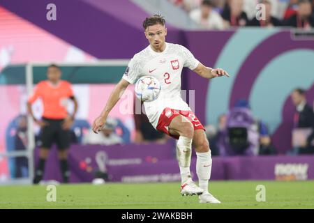 Matty Cash aus Polen wurde während des Spiels der FIFA-Weltmeisterschaft Katar 2022 zwischen Polen und Argentinien im Stadion 974 im Einsatz gesehen. Endstand; Polen 0:2 Argentinien. (Foto: Grzegorz Wajda / SOPA Images/SIPA USA) Stockfoto