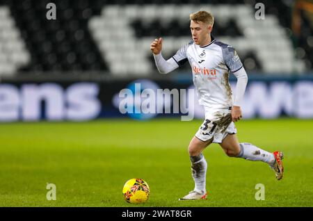 Swansea, Großbritannien. Januar 2024. Ollie Cooper vom Swansea City Emirates FA Cup, Spiel der 3. Runde, Swansea City gegen Morecambe im Stadion Swansea.com in Swansea, Wales am Samstag, den 6. Januar 2024. Dieses Bild darf nur für redaktionelle Zwecke verwendet werden. Nur redaktionelle Verwendung, Bild nach Credit: Andrew Orchard Sportfotografie/Alamy Live News Stockfoto