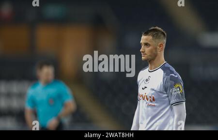 Swansea, Großbritannien. Januar 2024. Jerry Yates vom Swansea City Emirates FA Cup, Spiel der 3. Runde, Swansea City gegen Morecambe im Stadion Swansea.com in Swansea, Wales am Samstag, den 6. Januar 2024. Dieses Bild darf nur für redaktionelle Zwecke verwendet werden. Nur redaktionelle Verwendung, Bild nach Credit: Andrew Orchard Sportfotografie/Alamy Live News Stockfoto