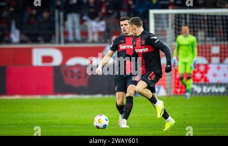 Leverkusen, Deutschland. Januar 2024. Granit Xhaka (Leverkusen), Florian Wirtz (Leverkusen) Bayer Leverkusen - FC Venedig 07.01.2024 Copyright (nur f Stockfoto