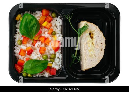 Fleisch mit Beilage in der Lunchbox auf weißem Hintergrund Stockfoto