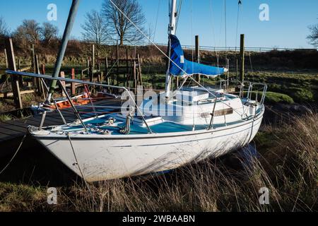 Skippool Creek Holzanker für Boote auf dem Fluss Wyre Lancashire UK Stockfoto